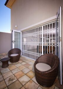 An image of a Retractable Security Gate closing off a patio.
