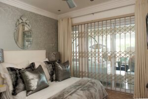 An image of a Retractable Security Gate securing a bedroom.