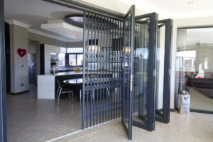 An image of a Retractable Security Gate & Clear Guard securing a home.