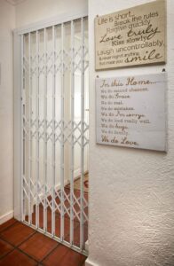 Retractable security gate image