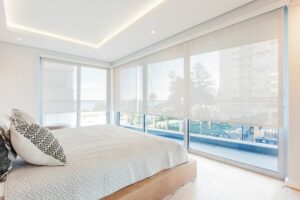 An image of roller blinds in a bedroom.