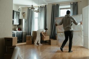 An image of people moving into an apartment.